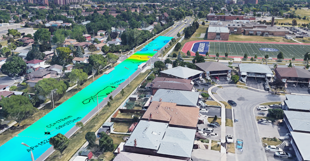 Informative Image displaying a top view photo of a major urban roadway that uses a colour coded and annotated overlay of the geotechnical information collected from the Pavement Distress Detection survey performed, offering the client greater visual interpretation pavement distresses and deterioration areas. 